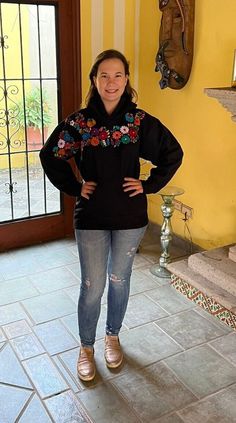 Each sweatshirt is a unique piece so the embroidery may vary. This beautiful sweatshirt is hand embroidered by Mexican artisans. It's great for keeping you warm in cold weather. It has a beautiful multi-colored floral embroidery. Sweatshirt has a kangaroo pouch on the front. We ship anywhere in the word, from Tepic, Nayarit,  mx. Made by artisans from Oaxaca, mx Casual Hooded Sweatshirt With Machine Embroidery, Casual Long Sleeve Hoodie With Machine Embroidery, Casual Embroidered Long Sleeve Sweatshirt, Casual Long Sleeve Embroidered Hoodie, Casual Long Sleeve Embroidered Sweatshirt, Casual Hooded Hoodie With Machine Embroidery, Hooded Cotton Sweatshirt With Machine Embroidery, Embroidered Black Hoodie For Fall, Cotton Hoodie With Machine Embroidery