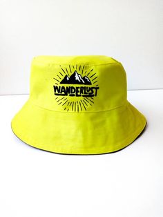 Wanderlust Bucket Hat, Neon green Bucket Hat, Handmade, Handpainted Fashionable and comfortable bucket hat head accessory. Perfect for covering the face and eyes from sun All hats are painted by hand so there might be some ever-so-slight differences (maybe a thicker/thinner brush stroke in some spots) No screen printing or vinyl transfers, it's all made from the heart baby :) IMPORTANT CARE INSTRUCTIONS: Hand wash, Spot clean, Air dry only, Do not bleach! Spot wash using a bleach-free, environme Yellow Bucket Hat For Outdoor Summer Activities, Yellow Bucket Hat For Spring Outdoor, Fun Wide Brim Bucket Hat For Outdoor, Yellow Summer Outdoor Bucket Hat, Fun Bucket Hat For Outdoors, Fun Bucket Hat For Outdoor, Yellow Beach Bucket Hat, Green Bucket Hat For Outdoor Activities, Green Bucket Sun Hat For Outdoor Activities