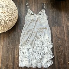 Gray Lace Trimmed Slip Dress No Size Best Fits Small Spring Lace Slip Dress In Midi Length, Spring Lace Midi Slip Dress, Bedtime Lace Slip Dress With Lace Trim, Spring Midi-length Lace Slip Dress, Flirty V-neck Slip Dress With Lace Trim, Casual V-neck Nightgown With Lace Trim, Summer V-neck Nightgown With Lace Trim, Vintage V-neck Lace Trim Slip Dress, Women's Intimates