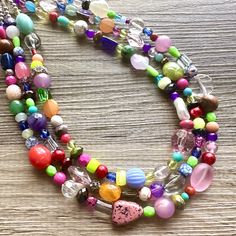 💞One of a kind & ready to ship💞  16 Inch Necklace (at shortest part) with a 4 inch silver extender chain and silver lobster clasp. A variety of rainbow acrylic and glass beads. Sure to make a BIG statement! Thank you for supporting American small business! *Smoke and pet free home!* I ship 6 days a week! This particular necklace is READY TO SHIP! Thank you for browsing my store! Check out my other items here: https://www.etsy.com/shop/PolkaDotDrawer?ref=si_shop Fun Multicolor Jewelry With Lobster Clasp, Colorful Adjustable Vibrant Necklace, Playful Colorful Jewelry For Jewelry Making, Playful Multicolor Necklace With Lobster Clasp, Multicolor Necklace With Lobster Clasp For Party, Trendy Multicolor Multi-strand Necklaces, Trendy Multicolor Multi-strand Necklace, Playful Multicolor Necklace, Funky Colorful Beads Necklace Gift