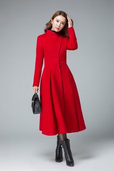 "This coats for women is new from Xiaolizi, The red winter coat is craft with wool blend, with a great shape and will keep you super warm. The pleates from the waist down gives a stunning feminine twist. Details: * More color https://etsy.me/36hi5SS * 50% wool blend, 50% fiber,nylon * Absolutely fantastic coat! Very well-made and fully lined (matching satiny material). * with warm high collar * deeper pockets on each side * Drop waist style with the coat * mid calf length * Wearable with sneaker Winter Wool Coat With Stand Collar, Pleated Coat, Red Winter Coat, Winter Mantel, Asymmetrical Coat, Boho Coat, Wool Winter Coat, Coat Stand, Stylish Coat