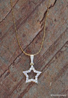 You are my shiny star necklace. Elegant sparkly star pendant set with tiny zircon stones hanged on a 14K Gold Filled chain necklace. Beautiful shimmering  classic star jewelry gift for her. Necklace fits with any outfit and looks great for any occasion day or night. This celestial jewelry is simple yet timeless. Perfect gift for a birthday, anniversary, mom, sweet 16, bridal or spoil a loved one.♥ DETAILSChain: 14K Gold FilledPendant: 13mm x 13mm (0.52" x 0.52") - Star 2 micron thick gold cover Gold Star-shaped Cubic Zirconia Necklace, Gold Cubic Zirconia Star Of David Necklace, Gold Cubic Zirconia Necklace With Star Charm, Yellow Gold Star-shaped Cubic Zirconia Necklace, Yellow Gold Star Necklace With Cubic Zirconia, Gold Star-shaped Jewelry With Sparkling Stones, Gold Star Jewelry With Sparkling Stones, Dainty Star-shaped Cubic Zirconia Necklace, Dainty Cubic Zirconia Star Necklace