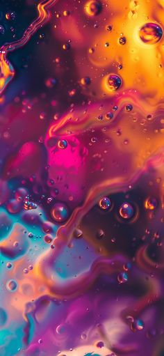 colorful liquid is seen in this close up photo