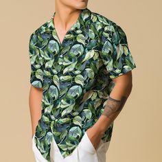 This Hawaiian shirt for men is a vibrant tropical button-up featuring an abstract plant design, perfect for any travel lover. Ideal as vacation wear or a casual button-down shirt, this nature-inspired floral shirt makes a great gift. 𝐃𝐄𝐓𝐀𝐈𝐋𝐒 🌿95% Polyester | 5% Spandex 🌿Boxy fit, straight cut 🌿Runs large, check your measurements against size chart 🌿Includes Chest Pocket 🌿Colors may appear different on different screens 𝗖𝗔𝗥𝗘 𝗜𝗡𝗦𝗧𝗥𝗨𝗖𝗧𝗜𝗢𝗡𝗦 🌿Machine Wash Warm (Max 40C or Tropical Vacation Outfits, Nature Shirts, Vacation Wear, Blue Hawaiian, Mens Hawaiian Shirts, Travel Lover, Plant Design, Floral Shirt, Resort Wear