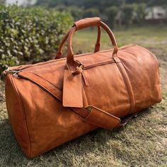 Leather Duffle Bag Features body { font-family: Arial, sans-serif; color: #333; line-height: 1.6; } h2 { color: #000; } Carry all your essentials in style with our genuine leather bag. Enjoy free shipping on all cowhide travel bags. 24"L x 11.8"W x 12.5"H (61cm x 30cm x 32cm) Made of high-quality, full-grain genuine cowhide leather with a rich texture and durable finish. Separate shoe compartment for organized packing and easy access. Main Compartment Spacious main compartment to fit all travel essentials including clothes, shoes, laptop, iPad, toiletry bags, files, and documents. Interior Features Inside laptop pocket 1 long zip pocket Multiple compartments for phone, wallet, and accessories Perfect for weekend getaways with a dedicated shoe compartment. Exterior Features Outside zip pock Weekender Bag Men, Mens Weekend Bag, Leather Toiletry Bag, Leather Weekender Bag, Leather Waist Bag, Real Leather Bags, Leather Duffel, Leather Weekender, Cowhide Bag