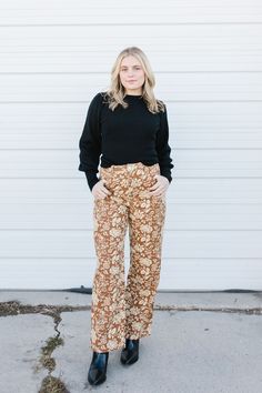 ALL SALES FINAL NOT ELIGIBLE FOR RETURN Step into style with the Keely Pant! These brown, floral-printed beauties are made from lightweight denim for all-day comfort. Featuring functioning buttons, pockets, and a zipper, plus sizes also have an elastic waistline. With a chic straight leg, these pants are a must-have for any wardrobe. The brand of these jeans are Polagram. Model is wearing a small and is 5'5". Shown wearing the Seely Sweater. Plus model is wearing a 1X and is 5'2". Shown wearing Floral Print Cotton Bottoms, Patterned Cotton Bottoms With Floral Print, Cotton Floral Print Patterned Bottoms, Patterned Floral Print Cotton Pants, Casual Patterned Bottoms With Floral Print, Casual Floral Print Patterned Bottoms, Casual Patterned Fall Bottoms, Casual Fall Patterned Bottoms, Casual Patterned Bottoms For Fall