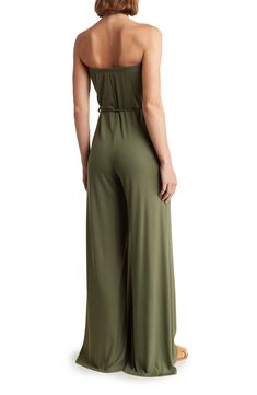 Ribbed fabric adds a subtle texture to a wide-leg jumpsuit topped with a strapless profile for a summery look. Strapless Side-seam pockets Removable waist tie 90% modal, 10% spandex Hand wash, dry flat Made in the USA of imported fabric Model stats: 5'10" height, 32" bust, 25" waist, 36" hip. Model is wearing size Small. Summer Strapless Bandeau Jumpsuit, Strapless Bandeau Jumpsuit For Summer, Spring Strapless Wide Leg Jumpsuit, Casual Strapless Jumpsuits And Rompers, Summer Maxi Length Jumpsuits And Rompers, Casual Strapless Jumpsuit Or Romper, Solid Maxi Jumpsuits And Rompers For Summer, Solid Maxi Length Jumpsuits And Rompers For Summer, Solid Color Maxi Length Jumpsuits And Rompers For Summer