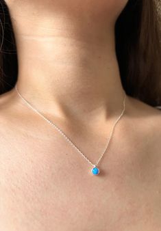 Dainty Opal Silver Necklace - Blue or White Opal Adjustable size from 15" -17.5" Adjustable size from 38cm to 45cm  O P A L  N E C K L A C E Looking to add some charm to your neckline? Check out this stunning Bezel Opal Necklace! With its delicate opal charm, it's the perfect accessory for any occasion.  Rock your everyday style, this minimal necklace will elegantly highlight your neck and décolletage. Get ready to shine and create memorable moments with this beautiful piece! * Material: High Quality 925 Sterling Silver, Opal * Finish: Sterling Silver * Featuring a 5mm x 5mm Bezel CZ Diamond pendant with an adjustable chain 15  inches to 17.5 inches. Please note that the colours of the products displayed on our website may appear differently on different screens and devices due to various Minimalistic Necklace, Opal Necklace Silver, Necklace Minimalist Jewelry, Bridesmaid Necklace Gift, Minimal Necklace, Jewelry Bridesmaid, Necklace Minimalist, Bridesmaid Necklace, Necklace Blue