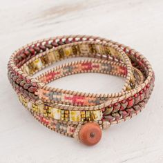 multi - colored beaded wrap bracelet with wooden button