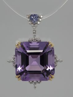 Brighten up your look with precious colours: PS   Diamonds   G/SI   BR   0.101ct/25pc  CS   Amethyst   CUS   7.580ct/1pc  SS   Iolite TRI   0.090ct/1pc Large - approx 8 carats - square amethyst  set in white gold and diamonds with a triangle Iolite.  Classic design, natural high-quality gemstones at very reasonable price. Add an adjustable (45cm max) 18k gold chain if you prefer a complete necklace. Mix and match with other Decouture jewels. Free shipment by Fedex. Decouture is a Collection by Roman Zakharyan.  Long before he began designing jewellery, Roman Zakharyan was held by a fascination with minerals and coloured gems. Aged 30, he moved to Florence to study at the Metallo Nobile Jewellery School, turning his passion into a profession. The Tuscan capital remains as one of the few pla Luxury Brilliant Cut Platinum Gemstones, Luxury Platinum Gemstones With Accent Stones, Luxury Diamond Gemstones For Formal Occasions, Luxury Gemstones With Diamond Accents, Luxury Amethyst Gemstones With Accent Stones, Luxury Diamond Cut Gemstones For Formal Occasions, Luxury Tanzanite Gemstones For Formal Occasions, Exquisite Formal Gemstones With Accents, Formal Purple Brilliant Cut Gemstones