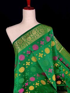 PLEASE NOTE - Width of dupatta is 32 inches and length is 92 inches. Gorgeous Green Color Banarasi Dupatta in Soft Silk Meenakari Chakras and black color tassles on the ends of the dupatta. Makes a Perfect Gift! Item: DupattaColor : GreenFabric : Banarasi Silk (Non-Pure Silk)Work : Meenakari Work with tassels Length of the dupatta : 32 inches (approx)Width of the dupatta : 92 inches (approx) Store Policies- No return or exchange will be accepted for color variations.- No return or exchange will Traditional Green Dupatta With Zari Work, Banarasi Silk Meenakari Dupatta In Pista Green, Green Banarasi Silk Dupatta With Meenakari, Pista Green Banarasi Silk Dupatta With Meenakari, Pista Green Meenakari Chanderi Dupatta, Festive Green Dupatta With Meenakari Detail, Green Dupatta With Pallu For Navratri, Green Shawl With Traditional Patterns And Drape, Pista Green Jamawar Dupatta For Festive Occasions