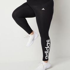 Leggings are a must-have in every wardrobe and these adidas Essentials high-waisted logo leggings from the brand's women's plus collection are a great option. They're crafted from cotton-jersey with light support to make them comfortable for all-day wear. Wear them with a t-shirt and sneakers. Closure Type: Pull OnRise: High RiseSupport: Light SupportFiber Content: 93% Cotton, 7% ElastaneFabric Description: JerseyInseam: 28 InCare: Tumble Dry, Machine WashPant Length: Full LengthCountry of Origi Adidas Logo Leggings For Jogging, Stretch Adidas Logo Leggings For Jogging, Adidas Stretch Leggings For Jogging, Adidas Sportswear Leggings For Jogging, Adidas Athleisure Activewear, Adidas Logo Stretch Leggings For Athleisure, Stretch Athleisure Leggings With Adidas Logo, Sporty Stretch Bottoms With Logo Print, Fitted Adidas Logo Activewear For Jogging