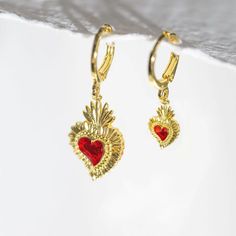 Mismatched Sacred Heart Earrings • Huggie • Fortune & Frame Unique Gold Earrings, Earrings To Make, Earring Hoop, Arrow Earrings, Huggie Earring, Divine Love, Mini Earrings, Sacred Symbols, Mini Studs