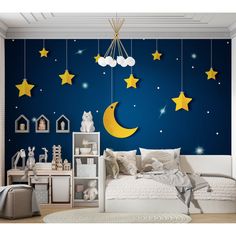 a child's bedroom with stars and moon decorations