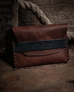 A meticulously made, modern, minimalistic cardholder. Lightweight and built to last; The Quimby Flap Cardholder is crafted using the best Italian Full Grain Leather from the Carlo Badalassi Tannery. Over time, a beautiful dark patina will develop further enhancing its vintage look to this timeless design. The wallet will hold up to 8 cards comfortably. Custom monogram available on the backside of the wallet. Minimalist Wallets With Interior Card Slots For Daily Use, Minimalist Rectangular Wallet For Everyday Use, Minimalist Everyday Wallet With Coin Pocket, Rectangular Minimalist Wallet For Everyday Use, Minimalist Rectangular Wallets For Everyday Use, Minimalist Coin Purse With Interior Card Slots, Minimalist Trifold Card Holder With Card Slots, Minimalist Everyday Rectangular Coin Purse, Minimalist Rectangular Everyday Coin Purse