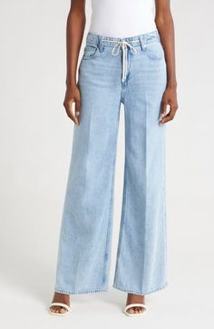 A tie at the high waist adds weekend-ready style to full-length, casual-chic wide-leg jeans made from soft, nicely draped nonstretch denim. 30 1/2" inseam; 22" leg opening; 11 1/2" front rise; 16" back rise (size 29) Tie waist Five-pocket style 60% cotton, 40% lyocell Machine wash, tumble dry Imported Chic High Waist Medium Wash Flare Jeans, Versatile Medium Wash Wide-leg Flare Jeans, Versatile Medium Wash Wide Leg Flare Jeans, High Waist Flare Jeans For Work, Elegant High Rise Relaxed Fit Jeans, Chic Medium Wash Flare Jeans For Spring, Spring Trendy Wide Leg Flare Jeans, Trendy Wide Leg Flare Jeans For Spring, Trendy Wide Leg Pants For Elevated Casual Fall