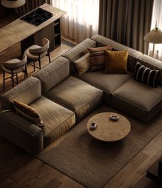 an overhead view of a living room with couches, tables and stools in it