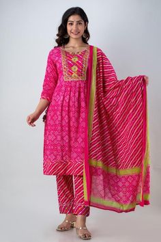 Traditional Pink Sets With Tassels, Traditional Pink Tassel Sets, Pink Tassel Sets For Navratri, Festive Pink Sets With Tassels, Festive Pink Tassel Set, Bohemian Pink Cotton Sets, Cotton Tassel Sets For Navratri, Pink Cotton Dupatta With Printed Motifs, Bohemian Cotton Sets With Tassels