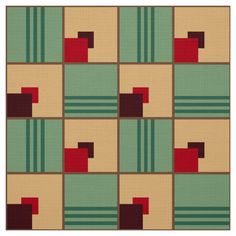 an area rug with squares and rectangles in green, brown, red and beige colors