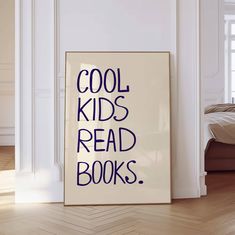 a poster that says cool kids read books on the floor in front of a bed