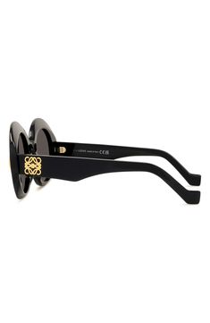 A looping, golden logo adorns the temples of sleek Italian-made oval sunglasses equipped with scratch-resistant CR-39 lenses. 50mm lens width; 24mm bridge width; 140mm temple length 100% UV protection CR-39 lenses Acetate Made in Italy Loewe Anagram, Golden Logo, Oval Sunglasses, Uv Protection, Temple, Lenses, Bridge, Nordstrom, Sleek