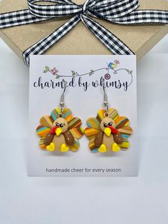 "Thanksgiving Turkey Dangle Earrings with Stainless Steel French Wire Earrings are approximately 1\" long. Free gift box included. Ready to ship." Handmade Brown Clip-on Earrings As Gift, Novelty Jewelry Gift Set With Matching Earrings, Adjustable Clip-on Earrings With Ear Wire As Gift, Hypoallergenic Drop Clip-on Earrings For Gift, Hypoallergenic Dangle Clip-on Earrings For Gift, Novelty Drop Earrings Jewelry Gift, Adjustable Dangle Clip-on Earrings As A Gift, Adjustable Dangle Clip-on Earrings For Gift, Novelty Dangle Jewelry For Gifts