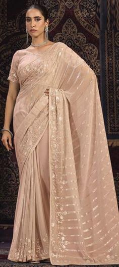 Pink and Majenta color Saree in Georgette fabric with Sequence, Thread, Zari work Elegant Georgette Dupatta For Ceremony, Beige Blouse Piece For Wedding With Traditional Drape, Fitted Beige Blouse Piece For Wedding, Beige Wedding Blouse Piece With Zari Work, Wedding Beige Blouse Piece With Zari Work, Elegant Saree With Intricate Embroidery For Ceremony, Elegant Saree With Pallu For Ceremony, Elegant Dupatta Fabric For Wedding, Elegant Ceremony Saree With Intricate Embroidery