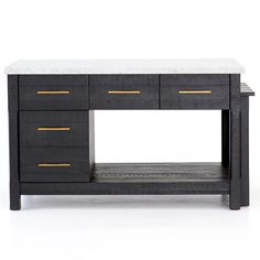 a black and white desk with gold handles