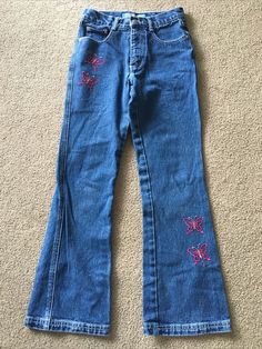 Up for grabs... A pair of Vintage U.R.i.t. embroidered jeans girls size 12 mom jeans, high waist from the 1990s.   These jeans are in excellent condition.  Actual Measurements: Waist:  26" Hips:  29" Inseam:  27.5" Rise:  9.5" They will come to you via USPS Priority Mail from a smoke free home! Happy Shopping! Butterfly Embroidered Jeans, Early 2000s Capris, Cute Colored Jeans, Vintage Embroidered Jeans, Embroidered Jeans Aesthetic, Y2k Embroidered Jeans, Embroiderd Jeans, Customize Pants, 1980s Jeans