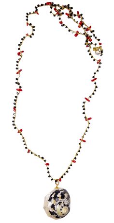 a beaded necklace with a black, white and red design