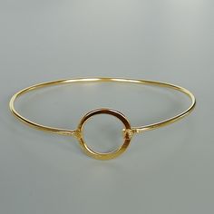 A set of sterling silver and gold plated circle of life cuff bangles. This listing is for TWO PIECES of bangles Length: 7 cms circle: 16 mm This bangle is made of 925 hypoallergenic sterling silver, one is silver and one is plated in gold. This piece is sent in a gift box. I can include a personal message from you if needed You are welcome to contact me at... bhavnakwintra1956@gmail.com For more beautiful pieces from my shop, please browse 👇 TOE RINGS: https://www.etsy.com/your/shops/TheSilverG Everyday Metal Bangle, Adjustable Modern Bangle, Modern Adjustable Round Bangle, Modern Hoop Bracelets As A Gift, Metal Hoop Bangle As A Gift, Simple Bangle Bracelets As Gifts, Metal Circle Bracelets As Gift, Simple Bangle Bracelet As Gift, Metal Bracelets As Gift