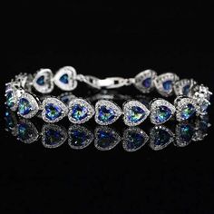 If you are looking for a fine jewelry which looks sepecial, precious stone please consider cubic zirconia in Wedding Bracelet Blue Crystal Bracelet, White Gold Bangle, Silver Tennis Bracelet, Cz Bracelet, Heart Crystal, Rainbow Bracelet, Cz Jewelry, White Gold Jewelry, Gold Bangle Bracelet