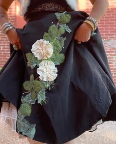 "1950s vintage black circle skirt with updated upcycled fiber art to wear floral embellishments. Felted wool foliage, pluses pleated flowers with rhinestone centers, hand embroidery and beads. 🦚 This skirt was is poor condition with flowers glued to it when my local friend and fiber artist Devi Haverly took it away for a rehab. Trash to treasure Embellished with flowers, felt, beads and embroidery. Full circle with original metal zipper and button closures. Wide waist and. Measures Waist 32\" L Black Circle Skirt, Embroidery And Beads, Flowers Felt, Embroidery Skirt, Upcycle Clothes Diy, Felt Beads, Rose Skirt, Organic Art, Fiber Artist