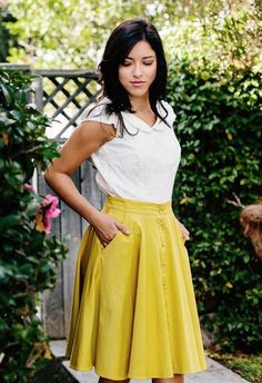 button-down skirt in canary Fitted Gathered Skirt Bottoms For Garden Party, Fitted Gathered Skirt For Garden Party, Relaxed Flared Skirt For Garden Party, Yellow Gathered Skirt Bottoms, Relaxed Fit Full Skirt For Garden Party, Relaxed Gathered Skirt For Garden Party, Relaxed Full Skirt For Garden Party, Garden Party Gathered Flared Skirt, Modest Skirt