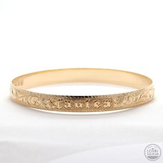 Hawaiian bangle bracelet Traditional Engraved Yellow Gold Ring, Classic Etched Bangle Bracelets, Classic Etched Gold Bracelet For Formal Occasions, Classic Etched Bangle Bracelet, Classic Etched Gold Bracelet, Traditional Jewelry With Engraving Option For Formal Occasions, Traditional Engraved 14k Gold Bracelet, Engraved Yellow Gold Bangle Bracelet, Traditional 14k Gold Engraved Bracelet