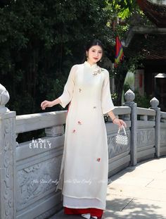 🌻Materia: Vải tơ voan Stretchy level: 0/10 This set includes: 1 ao dai top and 1 pants 🌻 The measurement of this ao dai (long dress) is in Vietnamese size (American size tends to be bigger for the same size). Please LOOK AT THE SIZE CHART CAREFULLY BEFORE ORDERING. There might have some chalk writings on the fabric due to making process. These marks can be washed away easily. 🌻🌻No returns or exchanges Buyer can contact seller about any issues with an order. 🌸 Follow us Facebook/aodaiemily www.aodaiemily.com 💜 Thank you very much!💜 White Ao Dai For Festive Occasions, Traditional White Ao Dai With Floral Embroidery, Festive White Embroidered Ao Dai, Festive Embroidered White Ao Dai, Traditional White Cheongsam For Spring, Traditional Embroidered Cheongsam For Spring, Traditional White Embroidered Ao Dai, Traditional Embroidered Spring Cheongsam, Traditional White Ao Dai For Festive Occasions