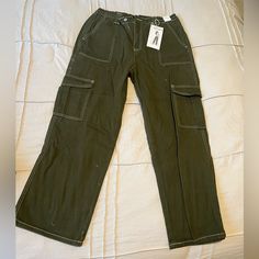 Never Worn, Brand New. Cargo Pants Green Mid-rise Bottoms With Pockets, Green Mid-rise Bottoms For Streetwear, Mid-rise Green Bottoms For Streetwear, Casual High Rise Pants With Hip Pockets, Casual High-rise Pants With Side Pockets, Casual Green Mid-rise Pants, Green Mid-rise Pants With Pockets, Trendy Green Pants With Multiple Pockets, Casual Green Jeans With Multiple Pockets