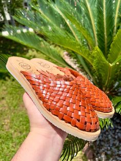 COLOR: BRICKUPPER: LEATHERSOLE: CREPE Handmade huaraches from Michoacán, Mexico. Made with 100% leather. SIZING *Please refer to sizing chart*If you wear a half-size shoe we recommend sizing down (ex: Your shoe size is 7.5, size down to size 7)If you have a wide foot, For example, your shoe size is 7.5 then size up for a more comfortable fit. Leather stretches and will mold after a few uses*Please advise since all of our huaraches are handmade with genuine leather minor wrinkles and markings mig Slip-on Huaraches With Rubber Sole For Vacation, Casual Closed Toe Woven Leather Mules, Casual Woven Leather Closed Toe Mules, Casual Woven Leather Mules With Closed Toe, Casual Natural Huarache Sandals Fair Trade, Casual Slip-on Huarache Sandals With Rubber Sole, Brown Closed Toe Woven Leather Mules, Leather Closed Toe Huarache Sandals For Vacation, Leather Huarache Sandals With Rubber Sole For Beach