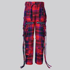 Discover Your Inner Highlander with the Clan Grant Modern Tartan Gothic Trousers: Experience the perfect blend of tradition, comfort, and edgy flair with the Clan Grant Modern Tartan Gothic Trouser X Strap Pant and Short from Skotsk. More than just clothing, this is a fashion statement for men and women who love to stand out. Make a Statement: Vibrant Clan Grant Tartan: Add a touch of Scottish heritage with a contemporary twist, letting your unique personality shine through. Versatile X-Strap Design: Switch between full-length trousers and trendy shorts effortlessly for different looks and occasions. For Everyone: Unisex Style: Breaking traditional fashion norms, these trousers are made to flatter both men and women, allowing everyone to express themselves. Ready for Anything: Sturdy 16oz Gothic Red Bottoms For Alternative Fashion, Gothic Red Bottoms For Fall, Red Punk Style Pants For Streetwear, Red Punk Pants For Streetwear, Red Punk Bottoms With Belt Loops, Red Punk Style Bottoms For Alternative Fashion, Red Punk Bottoms For Alternative Fashion, Red Pants For Alternative Fashion, Red Festival Bottoms With Pockets