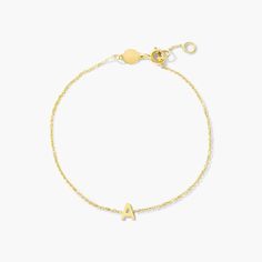 Letters can be so personal. This mini initial chain bracelet is the perfect staple piece to add to your collection. This 14K gold bracelet features a 7 inch chain that secures with a spring clasp. Letter measures 5mm. Luxury Gold Bracelets With Initials, Minimalist Yellow Gold Bracelets With Initials, Dainty Yellow Gold Name Bracelet With Initials, 14k Yellow Gold Monogram Bracelets, Gold Initials Name Bracelet In 14k Gold, Dainty Gold Bracelet With Cable Chain, 14k Yellow Gold Bracelets With Initials, Dainty Yellow Gold Bracelet With Cable Chain, Luxury Yellow Gold Name Bracelet With Initials