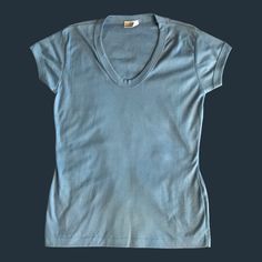 "65% Cotton 35% Polyester Made in China MEASUREMENTS: Armpit to Armpit 16.5\" Top Shoulder to Bottom Hem 24.5\" Sleeves 4\" Shoulder to Shoulder 14.5\" Smoke-free but pet-friendly household." Blue Stretch V-neck T-shirt, Casual Light Blue V-neck T-shirt, Blue Cotton Scoop Neck Top, Light Blue Fitted V-neck T-shirt, Basic Blue Scoop Neck Top, Fitted Blue T-shirt With Scoop Neck, Casual Blue Scoop Neck T-shirt, Basic Blue V-neck T-shirt, Blue Relaxed Fit Scoop Neck T-shirt