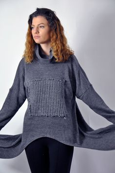 "Winter Wool Sweater, Dark Gray Sweater, Women Sweater, Warm and cozy sweater. Your winter days will be made easier with this practical loose sweater. With it you will feel very free. It is easy to combine. It is made of woolen knitting with an applique of woolen knitting. Unique and comfortable. ✂ Fabric: 100% wool Care - Hand wash , 30 Degree ◾ The style I used was originally designed and professionally constructed by me. Each item of my shop is specially packaged with a lot of concern! Handma Gray Chunky Knit Long Sleeve Sweater, Cold Weather Turtleneck With Funnel Neck, Chunky Knit Long Sleeve Sweater Relaxed Fit, Winter Crew Neck Sweatshirt With Knit Fabrication, Casual Cowl Neck Winter Sweater, Snug Winter Outerwear For Layering, Snug Fit Winter Outerwear For Layering, Gray Long Sleeve Turtleneck, Gray Knitted Sweater For Layering