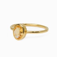 This golden variety of quartz is the perfect gem to wear day or night and transform any style. Known as the stone for wealth and abundance. Carrying the power of the sun, this warm and comforting, energizing, and life-giving stone will not only brighten any outfit but also brighten your life in more ways than one. This Citrine ring does not hold and accumulate negative energy therefore this stone never needs cleansing. Stone Origin: Brazil Current Size: 6.5 Measures Approximately: 8 x 6 mm Mater Modern Gold Crystal Ring With Gemstone, Spiritual Yellow Gold Crystal Ring, Gold Crystal Ring With Topaz Birthstone, Elegant Birthstone Rings For Healing, Faceted Citrine Promise Ring Jewelry, Fine Jewelry Citrine Gemstones In Gold, Timeless Citrine Gemstone Rings, Spiritual Yellow Gold Crystal Ring With Gemstone, Gold Citrine Gemstone Fine Jewelry