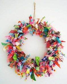 a colorful wreath is hanging on the wall