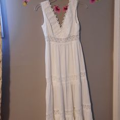 White Lace And Sleevless Vneck Dress Has A Short Slip And Gause Like Fabric Throughout Nwt And Ready For Any Occasion White V-neck Sleeveless Dress For Spring, Feminine V-neck Sleeveless Dress For Beach, White V-neck Sleeveless Vacation Dress, White V-neck Sleeveless Dress For Vacation, White V-neck Bohemian Sleeveless Dress, White Bohemian V-neck Sleeveless Dress, White Sleeveless Lace Trim Dress For Beach, White Sleeveless Maxi Dress For Brunch, Sundress Style Maxi Dress With Lace Trim And V-neck