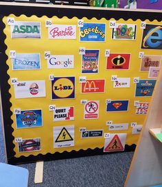 a bulletin board with various stickers on it