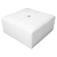 a white square ottoman with studding on the top and bottom, in front of a white background