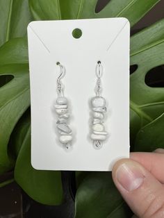 Dangle earrings are roughly 2 inches total in length. Made of authentic crystal chips, silver coated non tarnish wire, and 925 sterling silver earring hooks with rubber backs. White Hypoallergenic Drop Crystal Earrings, Adjustable White Crystal Earrings, White Crystal Drop Earrings With Ear Wire, Adjustable Nickel-free White Crystal Earrings, Minimalist White Crystal Drop Earrings, White Sterling Silver Linear Earrings, Adjustable Dangle Crystal Earrings With Ear Wire, White Sterling Silver Hypoallergenic Linear Earrings, Hypoallergenic White Sterling Silver Linear Earrings