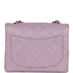 This Vintage Mini Square flap bag is of Light Purple Lambskin with matte gold hardware and has a front flap with signature CC turnlock closure, rear half moon pocket, and an interwoven purple leather and gold tone chain link shoulder/crossbody strap.The interior is lined in purple leather and features a zipper pocket with Chanel pull and an open pocket below.Collection: 6-Series (2000-2002)Origin: FranceCondition: Vintage; Excellent - This bag retains its shape with slight wrinkling, scratching Chanel Mini Square, Chanel Box, Chanel Mini, Bag Light, Purple Leather, Vuitton Bag, Vintage Chanel, Flap Bag, Matte Gold