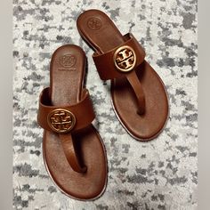 Tory Burch Sandals In Great Condition! Sz 7 Tan Leather Footbed Slip-on Sandals, Tan Leather Open Toe Flip Flops, Tan Cushioned Sandals For Beach, Tan Round Toe Sandals For Beach, Tan Slip-on Sandals With Branded Insole, Tan Sandals With Leather Footbed And Round Toe, Tan Leather Sandals With Round Toe, Tan Flat Sandals With Leather Footbed, Tan Sandals With Leather Footbed And Flat Heel